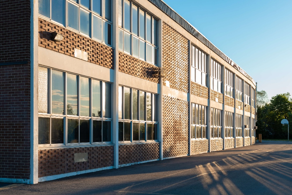 school-building-and-schoolyard-in-the-evening-2023-04-18-02-42-29-utc-1